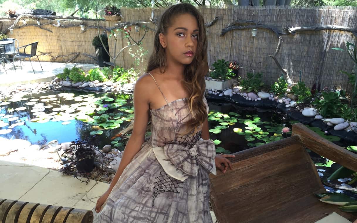 A Green Embassy dress made with organic silk, vegetable dyes and fishing net cut offs (SBS)