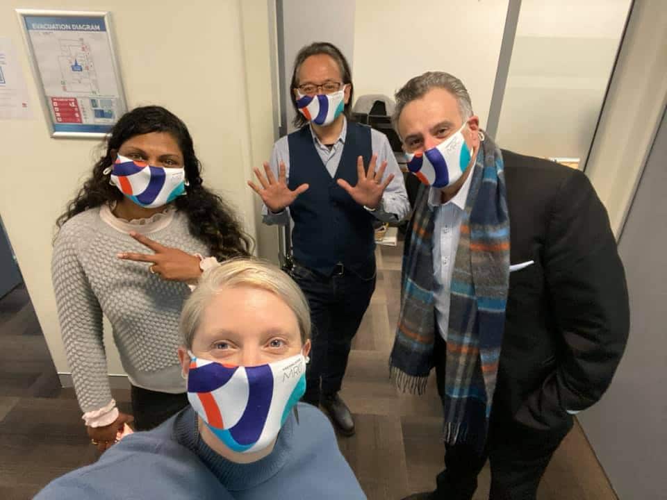 Rachel Haywood (bottom left) with members of the team at Western Sydney Migrant Resource Centre (MRC) in June.