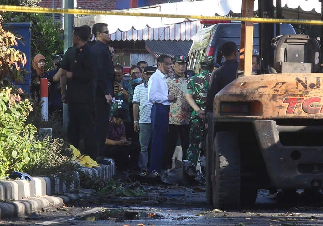 Indonesian President Joko Widodo visits one of the sites of the church attacks in Surabaya, East Java.
