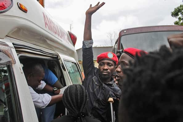 Ugandan singer-turned-politician Robert Kyagulanyibetter known as Bobi Wine, gets into an ambulance after being released on bail last week.