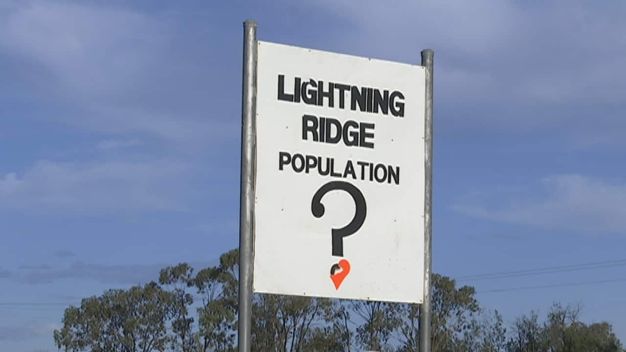 Community groups in Lightning Ridge say they've had great difficulty confirming the town's population.