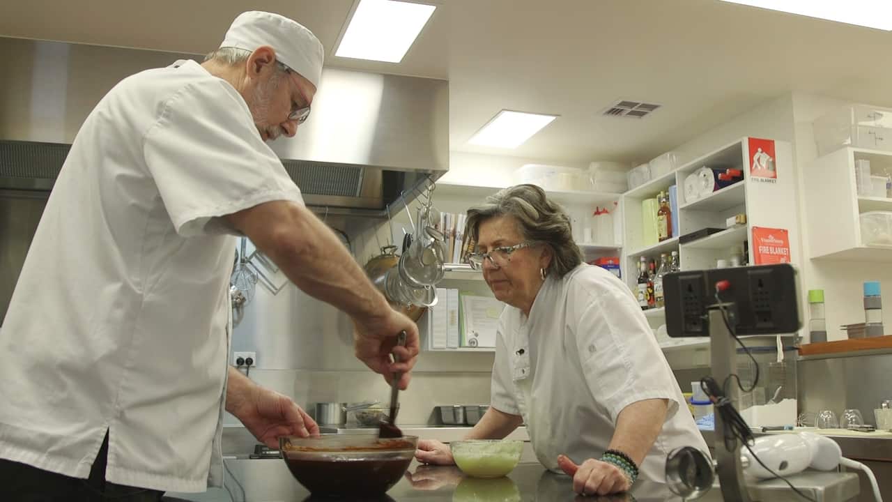 Isilda and Milton working together to create their award winning chocolate.