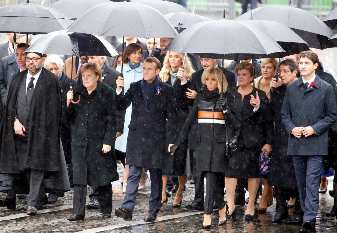  (L-R) Prince Moulay El Hassan, King of Marocco Mohammed VI, German Chancellor Angela Merkel, French President Emmanuel Macron, his wife Brigitte Macron and Canada's Prime Minister Justin Trudeau arrive to attend the international ceremony of the Armistic