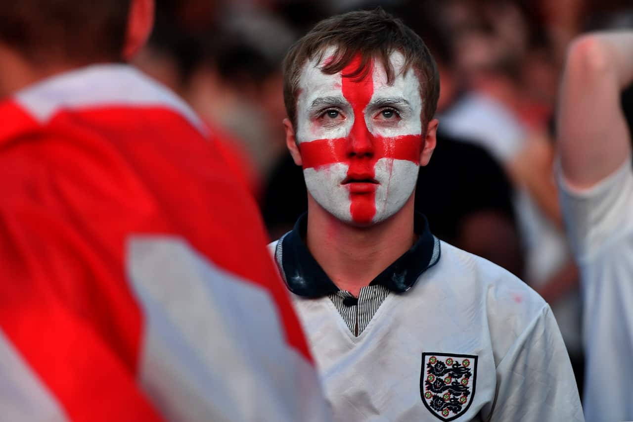 A dejected England fan watching from Manchester after his side lost to Croatia in the World cup semi-final