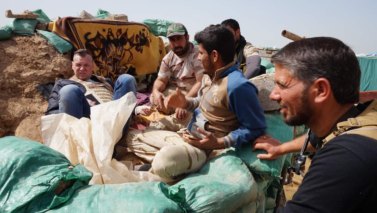 Mr Drury says his groups also came under fire when he visited those fighting on the frontline.