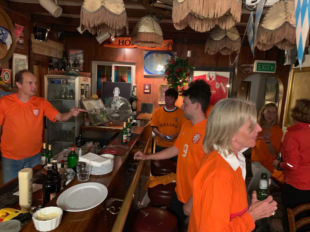 Pieter van Rijn behind his bar upstairs at Una's