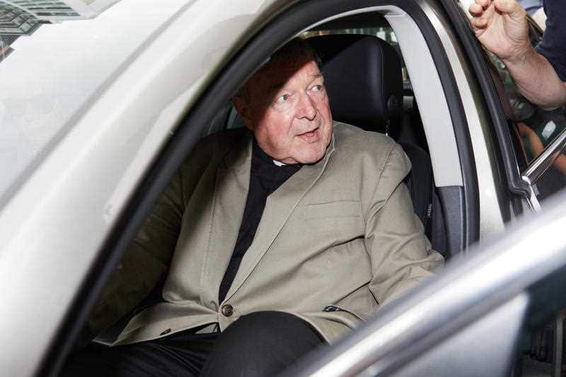 Emotions were high outside as Pell left, with one spectator yelling he hoped the cardinal "burned in hell".