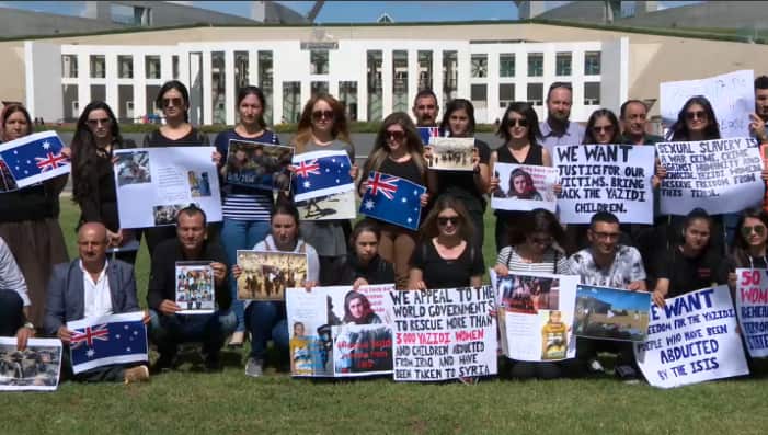 The Yazidi rally outside Parliament House, Canberra, Australia.