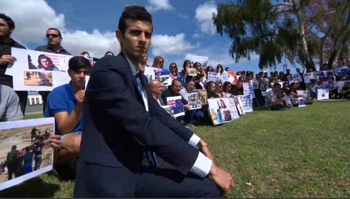 Yazidis rally outside Parliament House, Canberra, Australia.