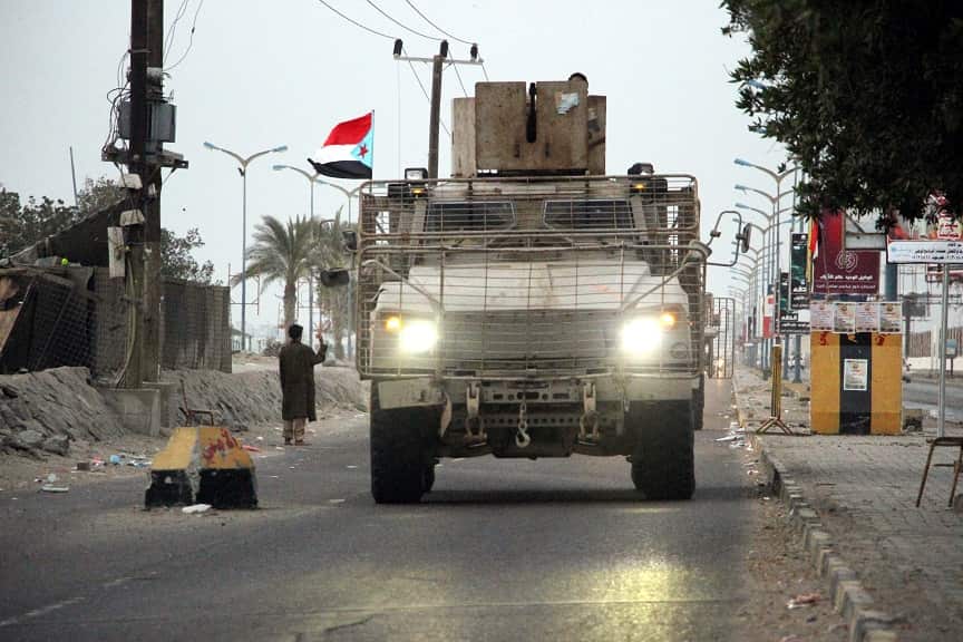 Forces of the separatist Southern Movement patrol a street following clashes in the southern port city of Aden.