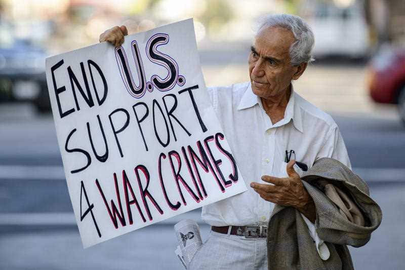 A man protests the U.S. involvement in Saudi Arabia's war in Yemen. In Los Angeles.