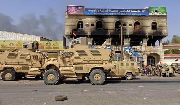 Yemeni pro-government forces gather on the eastern outskirts of Hodeida, as they continue to battle for the control of the city.