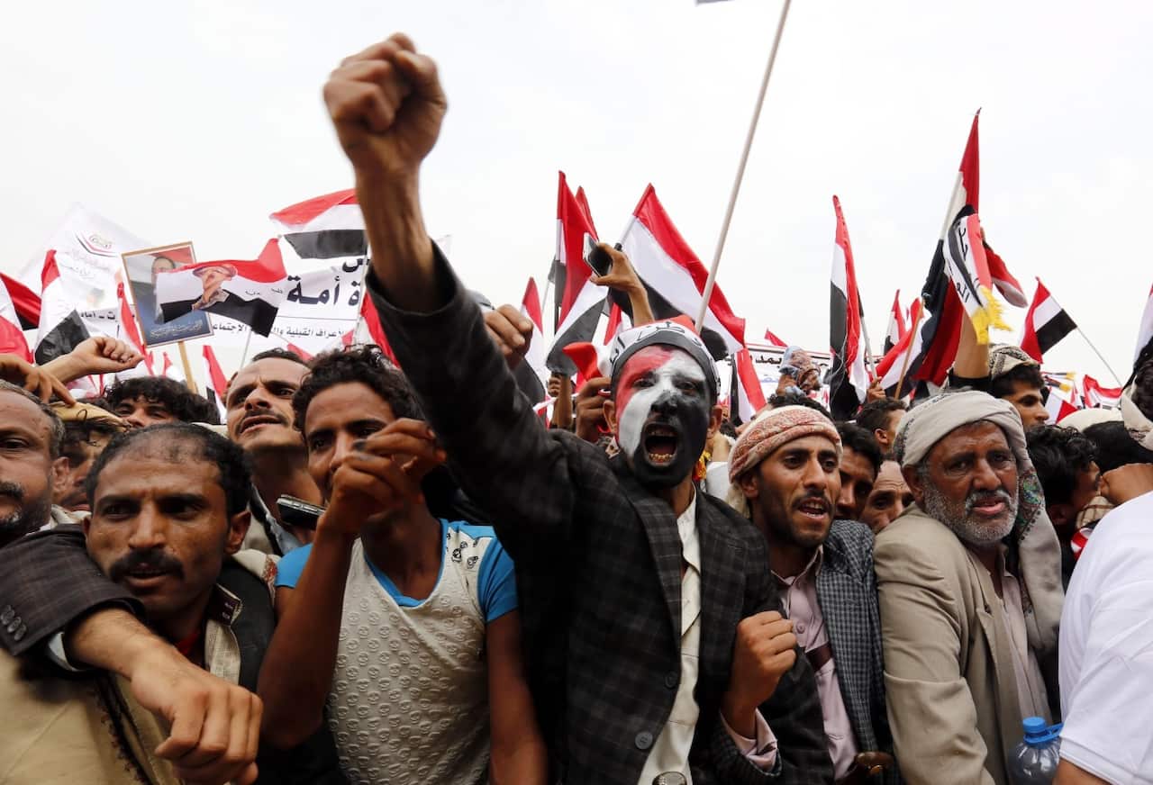 Yemenis shout slogans during a rally in support of the newly formed supreme political council, Sana'a,