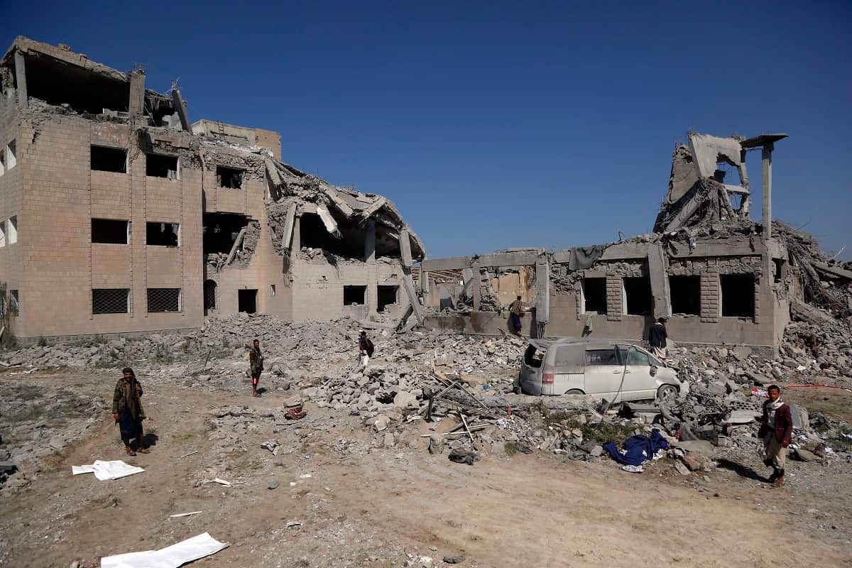 Rescue workers search for victims of airstrikes on a prison carried out by warplanes with the Saudi-led coalition September 01, 2019.