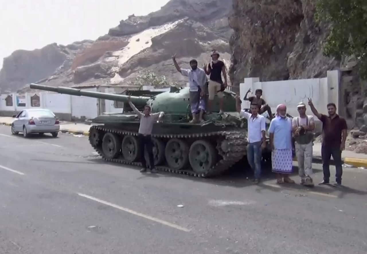 Fighters loyal to the separatist so-called Southern Transitional Council, backed by the United Arab Emirates, near the presidential palace, in Aden (AAP)