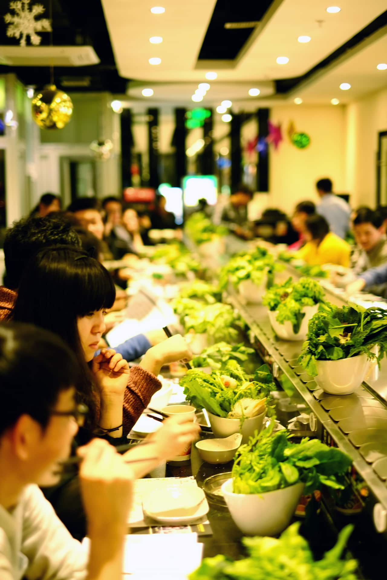 Young Chinese singles attend a match-making hotpot dinner event in Beijing. (Katrina Yu)