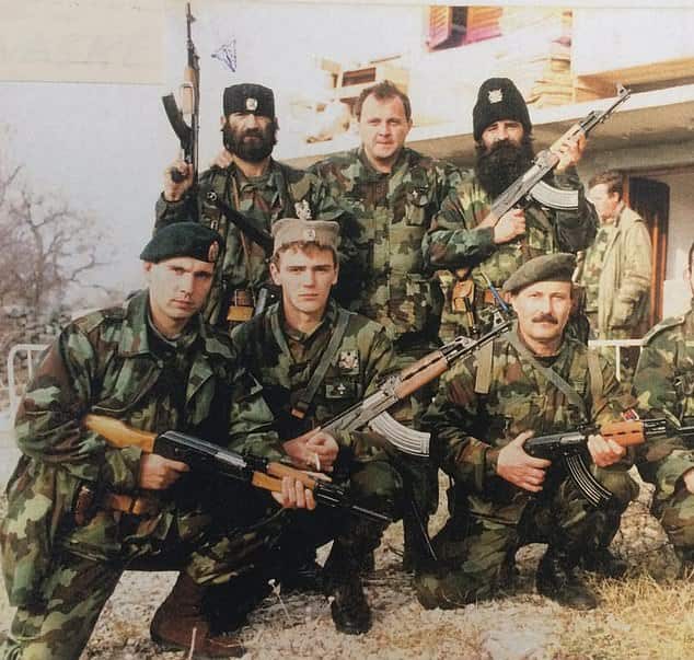 Mr Tadic (centre) was allegedly the leader of a Serbian paramilitary unit at the time of the brutal massacre.