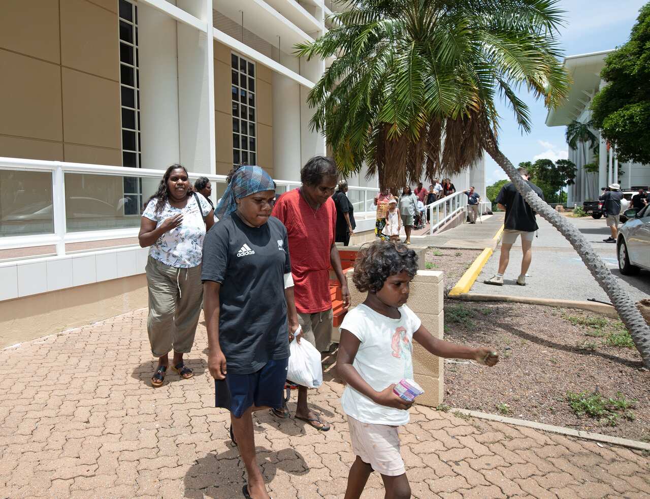 Kumanjayi Walker's family and supporters leave the court