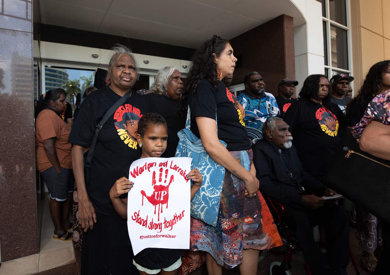 Family and friends of Kumanjayi Walker outside the Darwin Supreme Court after the acquittal of Zachary Rolfe. 
