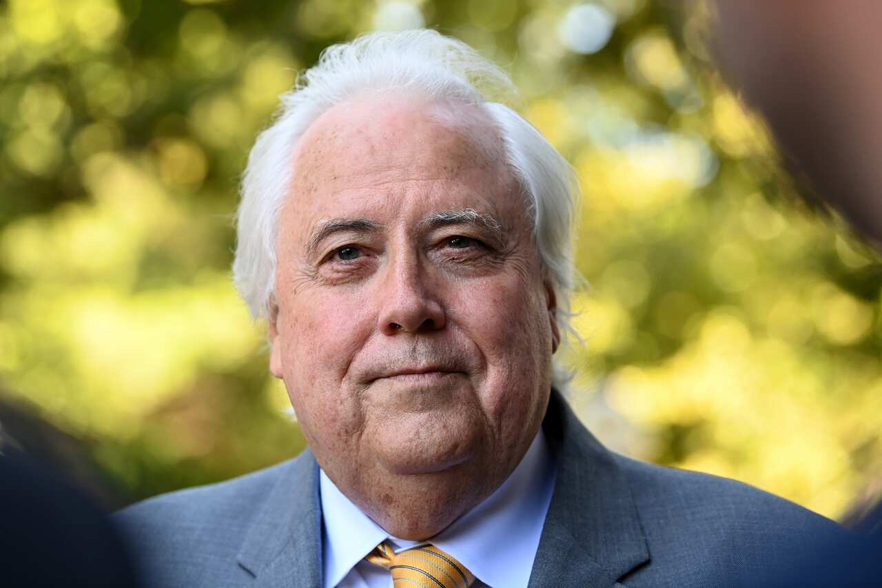 Clive Palmer speaks to the media outside the Federal Court of Australia, in Sydney, Wednesday, February 16, 2022. Businessman Clive Palmer is suing West Australian Premier Mark McGowan claiming public comments, including labelling him the "enemy of West A