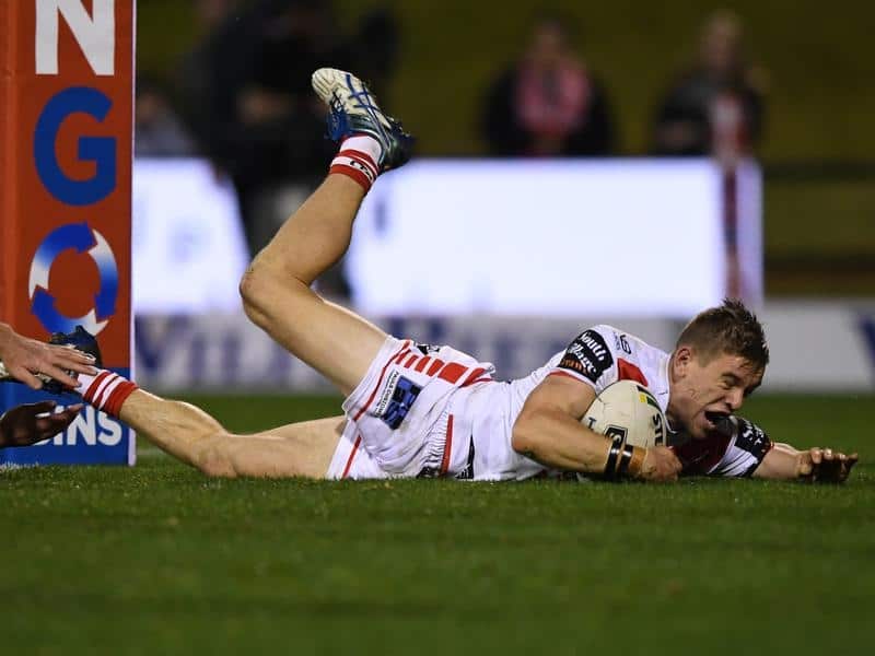Mathew Dufty of the Dragons scores a try.