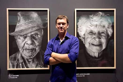 Asher Millgate at his SURVIVORS exhibition.