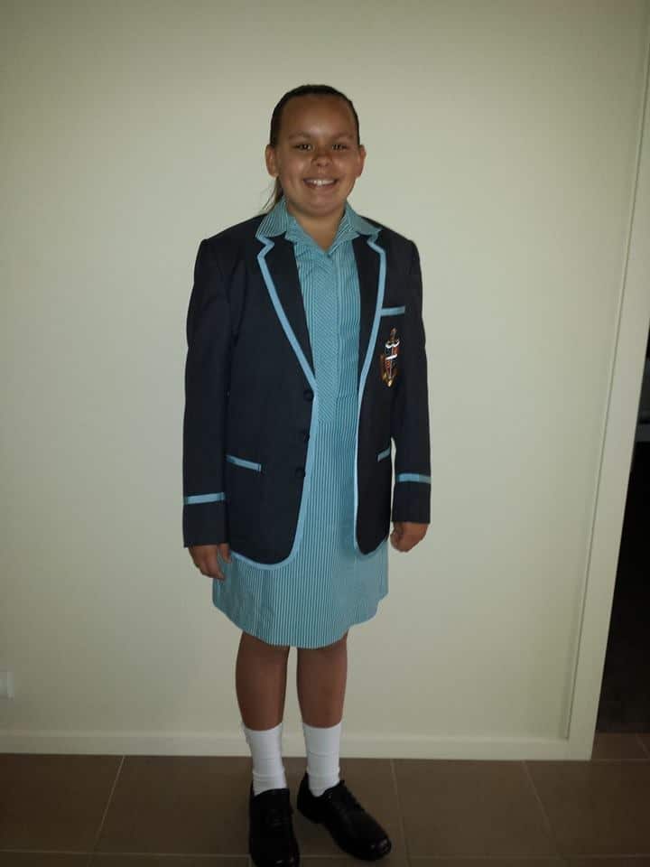 A young Zoe Walters in school uniform