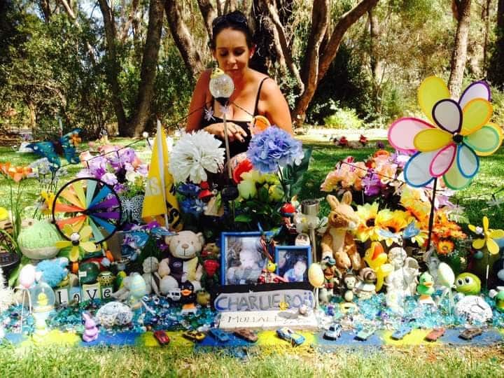 Photo of Yamatji woman, Tamica Mullaley at baby Charlie's grave