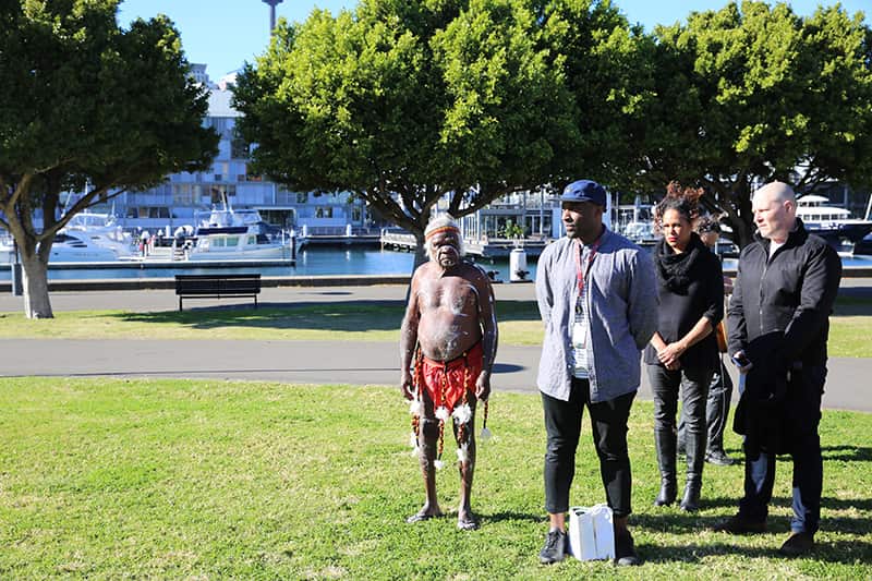 Uncle Max Eulo and Christine Anu standing with Google staff at the launch event