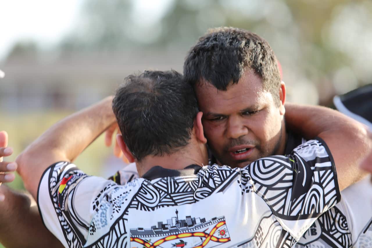 Redfern All Blacks celebrated winning the Men's tournament at the 2015 Koori Knockout.