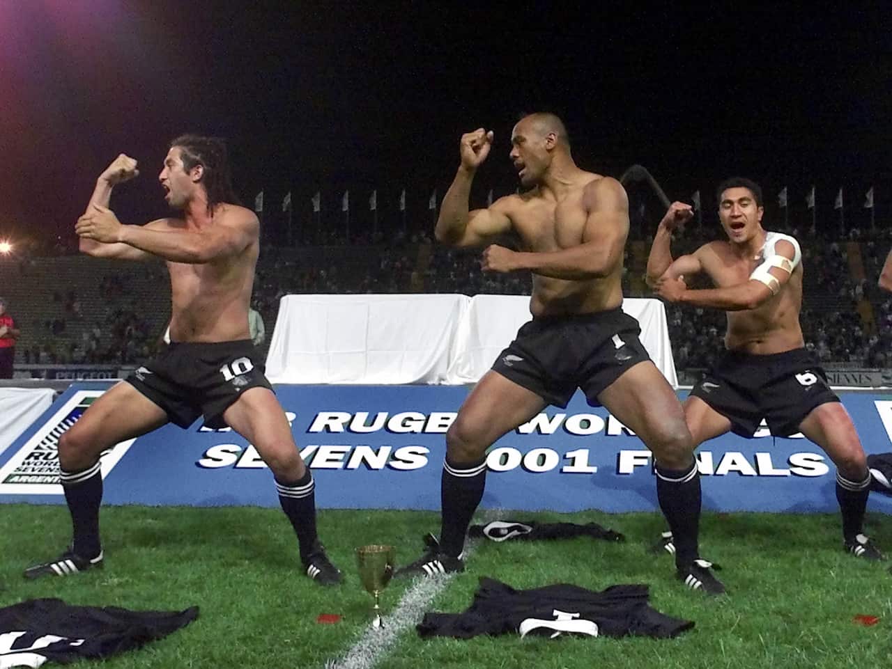 Karl Te Nana, Jonah Lomu, center, and Brad Fleming during the ritual Haka, after defeating Australia 31-12 in the final game of the Rugby Sevens World Cup in Mar del Plata, January 28, 2001.