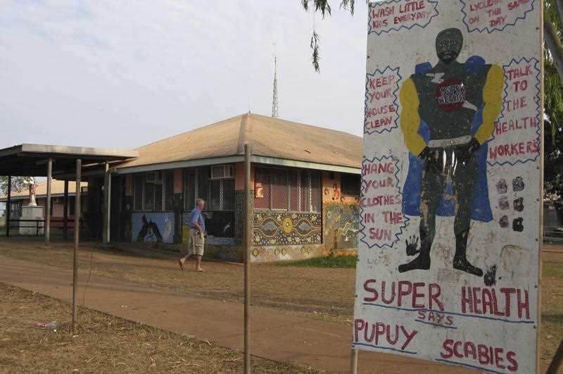  a sign giving tips of how to eradicate scabies outside the health clinic in Wadeye in the Northern Territory in Australia. 