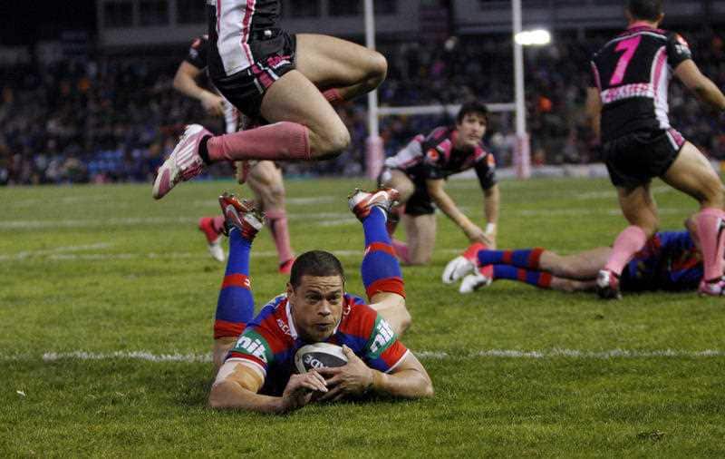 Timana Tahu scores his 3rd try in a match between Newcastle Knights and West Tigers.