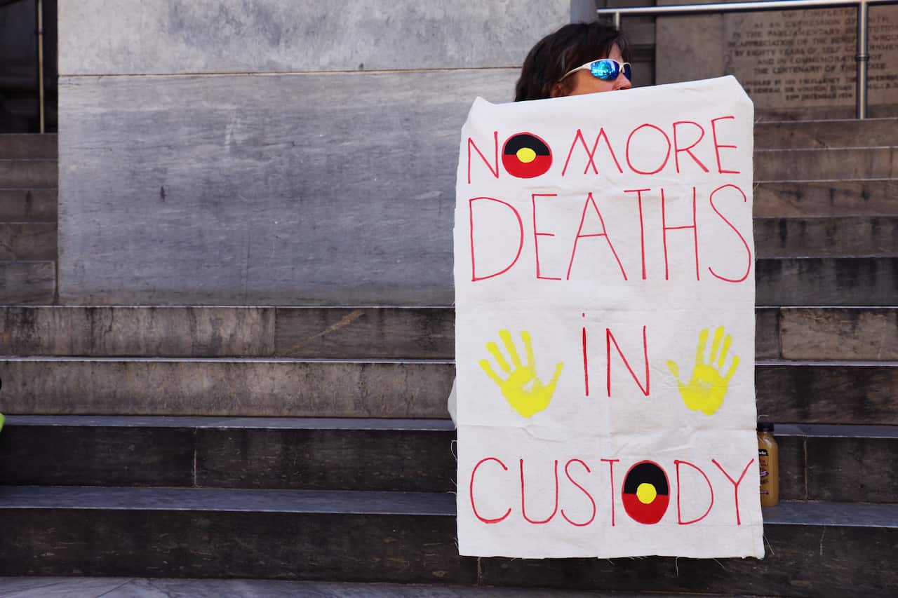 A 2014 protest demanding an independent inquest into the death , Ms Dhu.