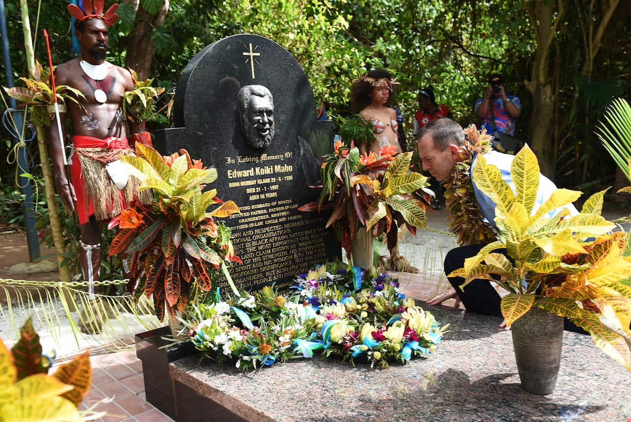 Prime Minister Tony Abbott lays wreath as he visits the grave of Eddie Mabo.