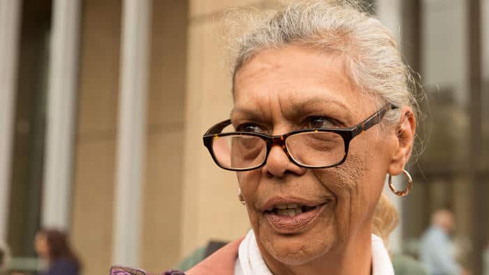 Jenny Munro, founder of the Redfern Aboriginal Tent Embassy, gathers at the Supreme Court on August 27, 2015 to celebrate a $70 million federal government deal that will ensure the construction of 62 homes for Indigenous families at the Block in Redfern