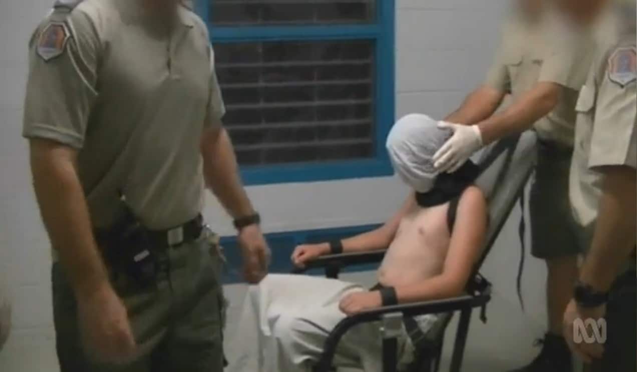 A boy strapped to a mechanical chair in the Don Dale Youth Detention Centre in Berrimah, NT.