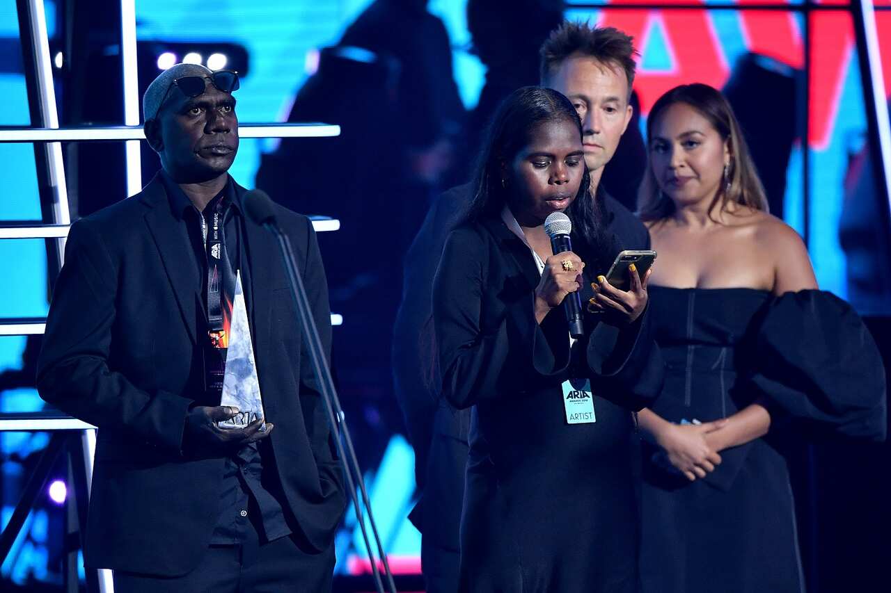 Johnno Yunupingu (left) and Jasmine Yunupingu accept the ARIA for Best Male Artist on behalf of Geoffrey Gurrumul Yunupingu during the 32nd ARIA Awards at The Star, in Sydney, Wednesday, November 28, 2018. (AAP Image/Joel Carrett) NO ARCHIVING
