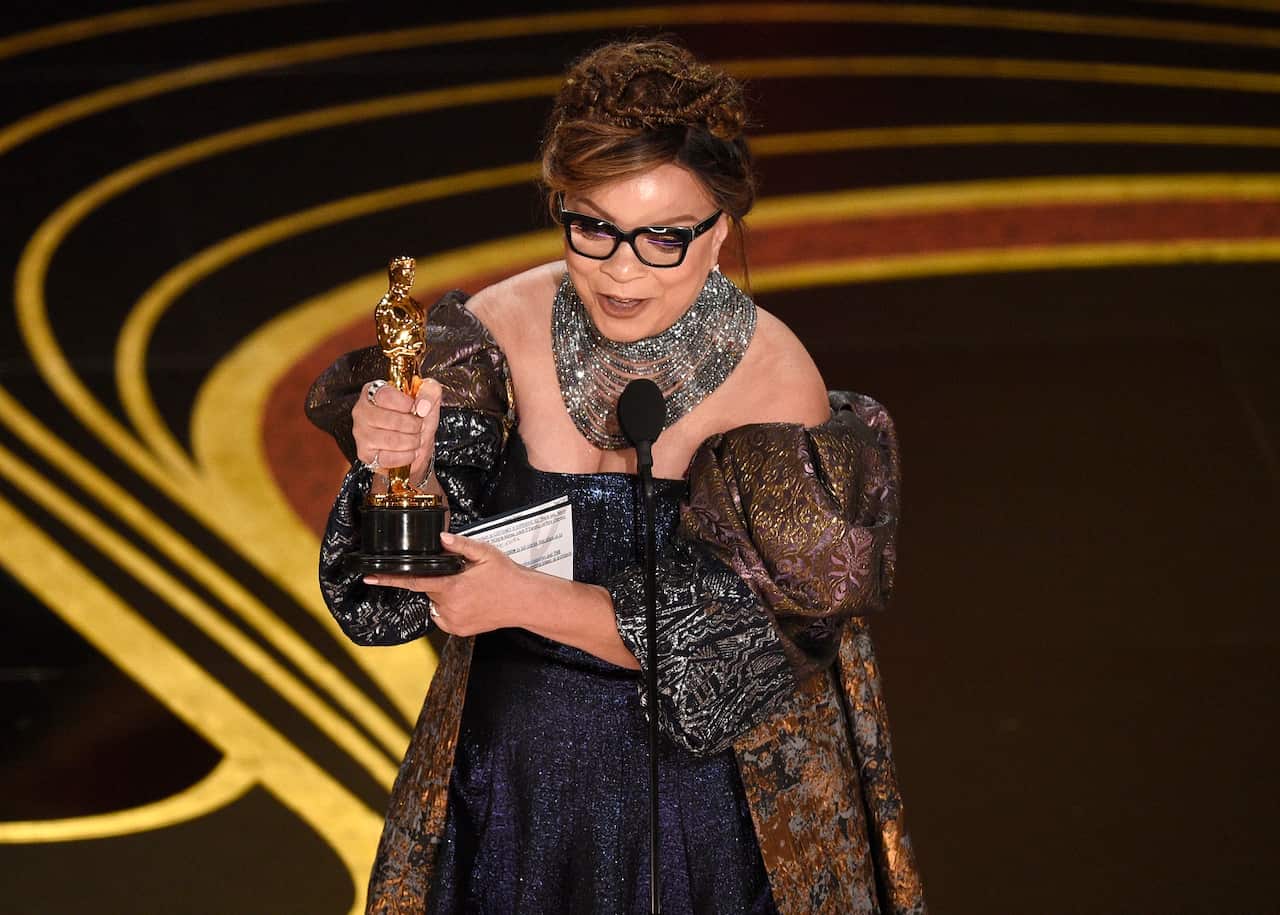 Ruth Carter accepts the award for best costume design for 'Black Panther' at the Oscars