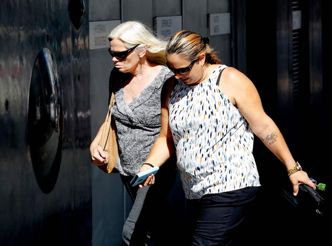 Mother of Rebecca Maher, Debbie Small (left) arrives at Newcastle Court, Monday, March 4, 2019. A ten-day inquest begins into the death of Rebecca Maher, 36, who was found dead in a Maitland police cell in 2016. (AAP Image/Darren Pateman) NO ARCHIVING