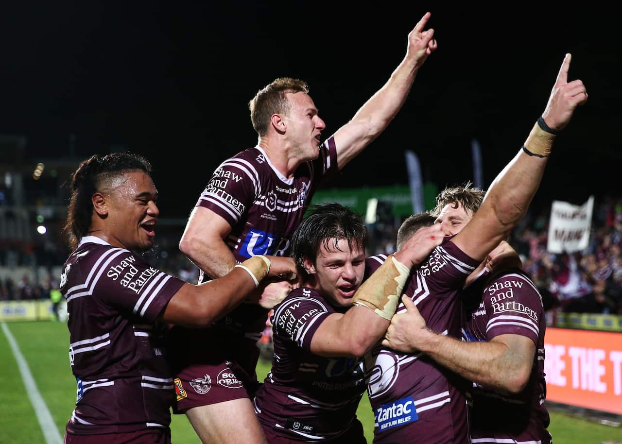 Brendan Elliot of the Sea Eagles celebrates scoring a try during the NRL Elimination Final agaianst the Cronulla Sharks at Lottoland.(AAP Image/Brendon Thorne) 