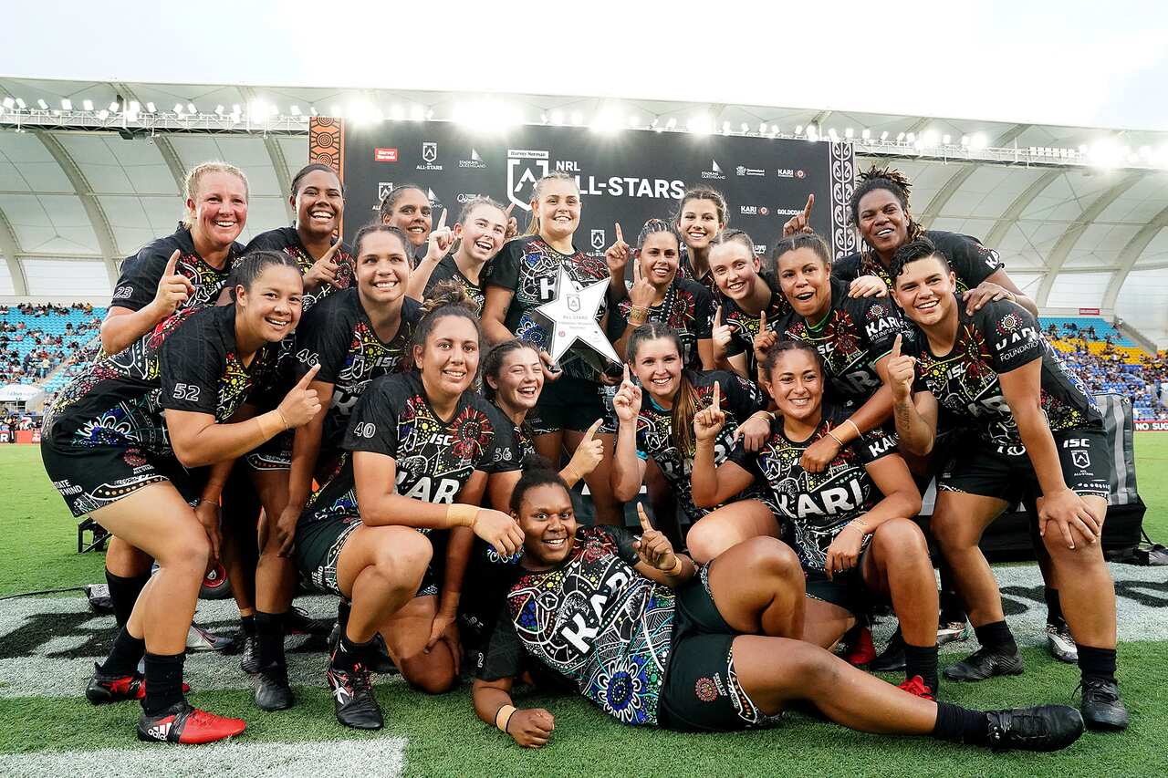 The Indigenous Womens Team pose for a team photo after defeating the Maori Women All Stars team at CBus Super Stadium on the Gold Coast, Saturday, February 22, 2020