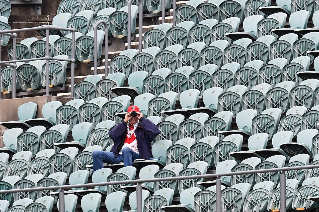 NRL fans turn out at WIN Stadium for the last game to be played in front of spectators.