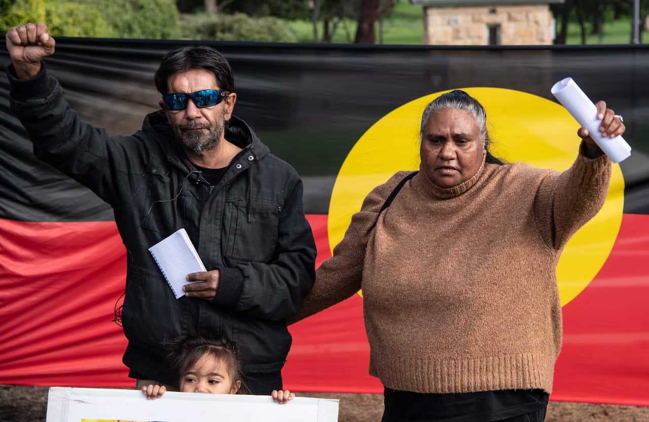 Tane Chatfields parents Colin and Nioka Chatfield speak to supporters gathered outside the inquest into Tane Chatfields death.