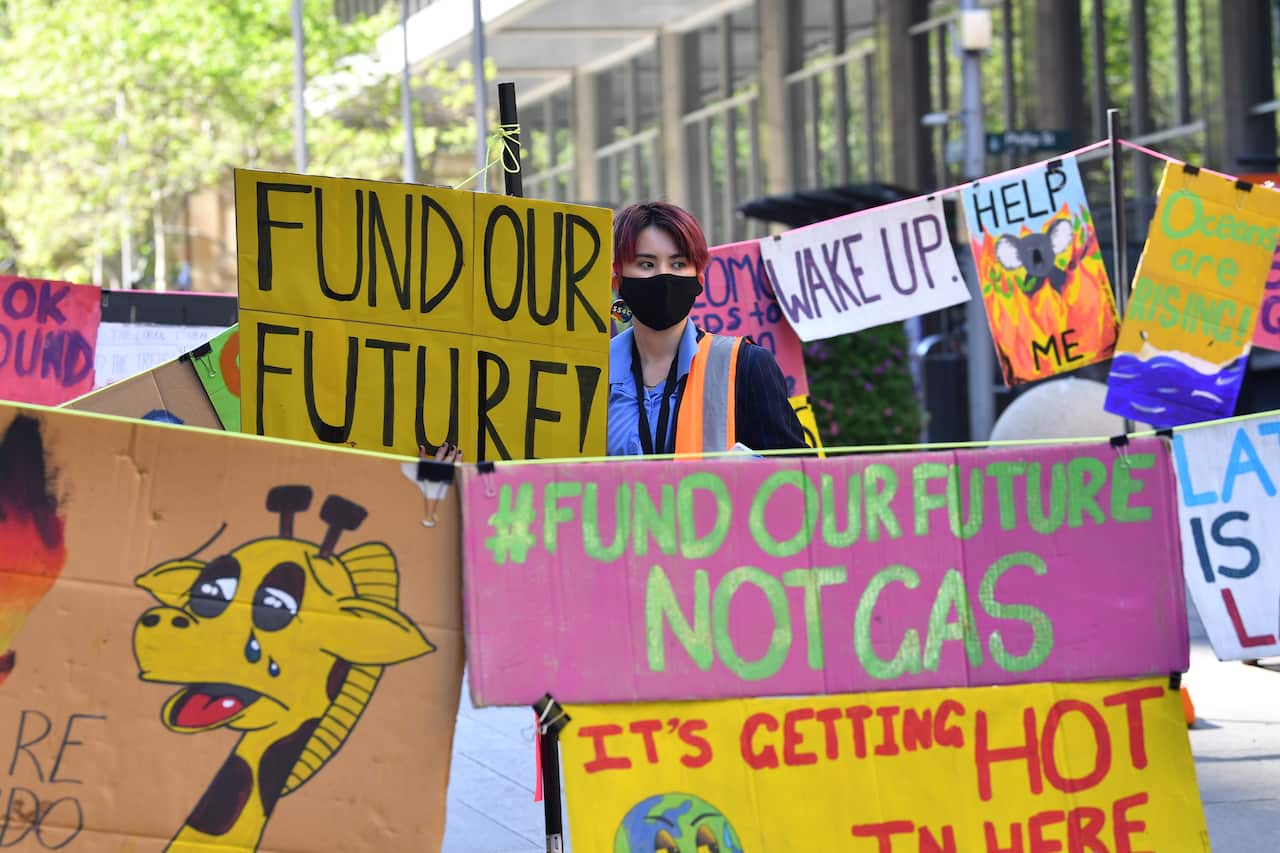 A small gathering of school students take part in Fund Our Futures Not Gas climate rally in Sydney.
