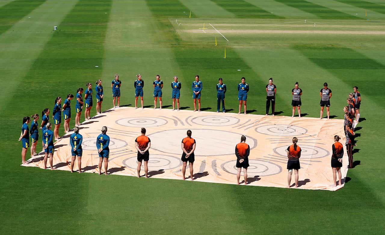 Players stand in solidarity for 'Close The Gap' in between Indigenous and Non Indigenous Australians - T20 International match between Australia Women and NZ