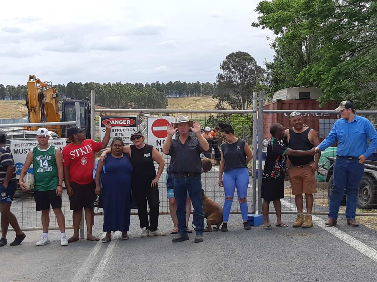 Cattle famer John Cousins (front centre) who initiated the court action to stop the demolition with members of the Jubullum community.