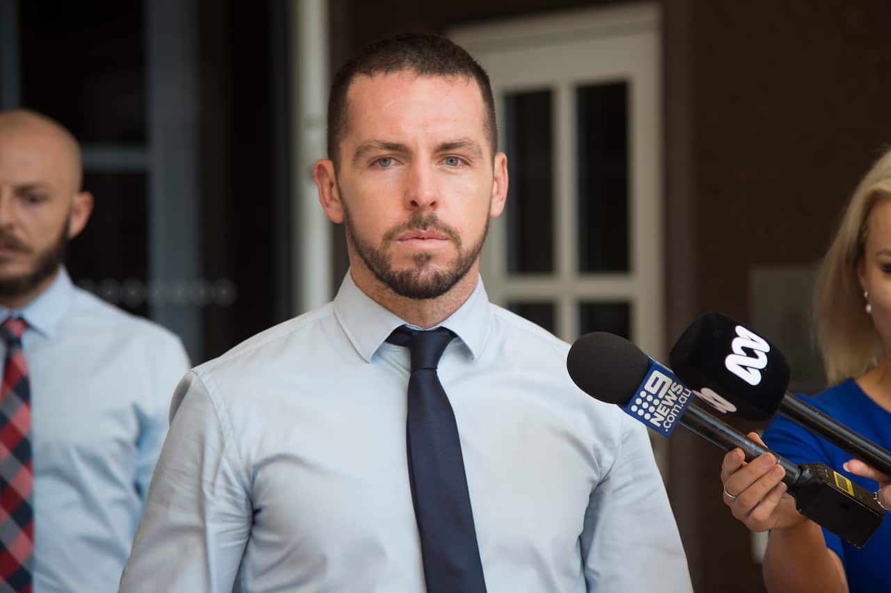 Zachary Rolfe departs the Supreme Court of the Northern Territory in Darwin, Thursday, March 10, 2022. Constable Zachary Rolfe has pleaded not guilty to murdering Kumanjayi Walker. (AAP Image/Aaron Bunch) NO ARCHIVING