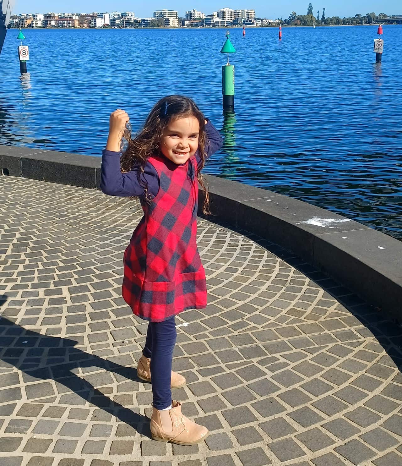 A young girl smiling