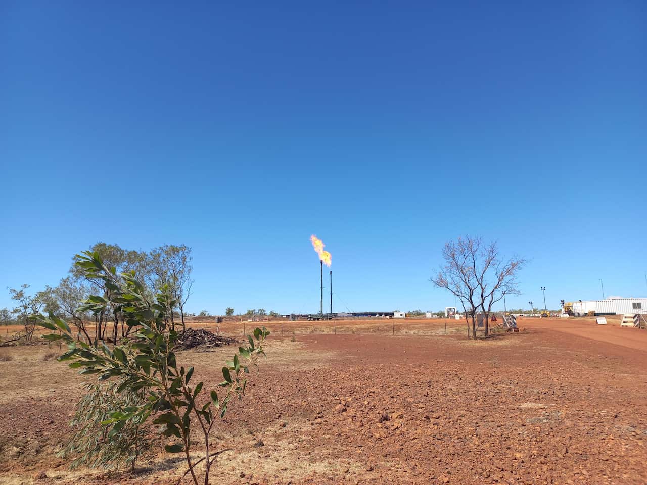 Flaring gas wells on Tanumbrini Station in the Beetaloo. 